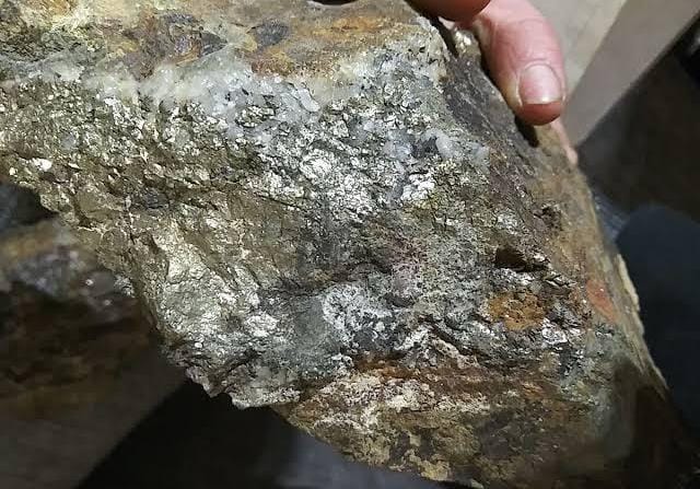 Copper pyrite (chalcopyrite) mineral in golden metallic tones used for copper production, metallurgy and chemical applications.