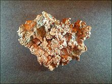 Raw copper ore with visible metallic veins used for copper refining, metallurgy and industrial applications.